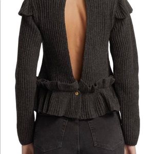 GANNI
Ruffle Trim Turtleneck